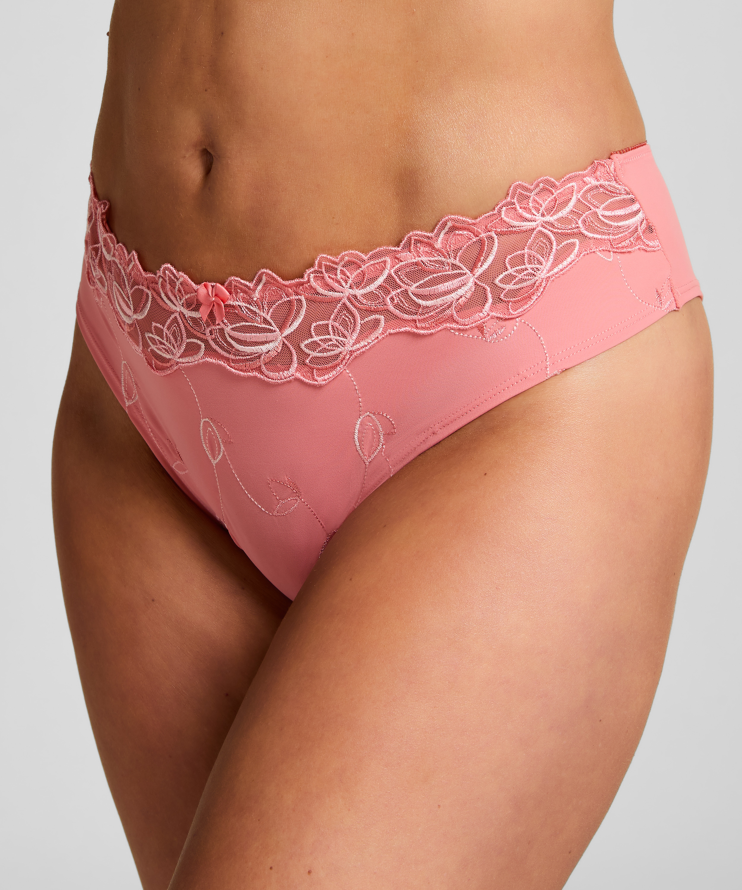 Slip brésilien Diva, Rose, main