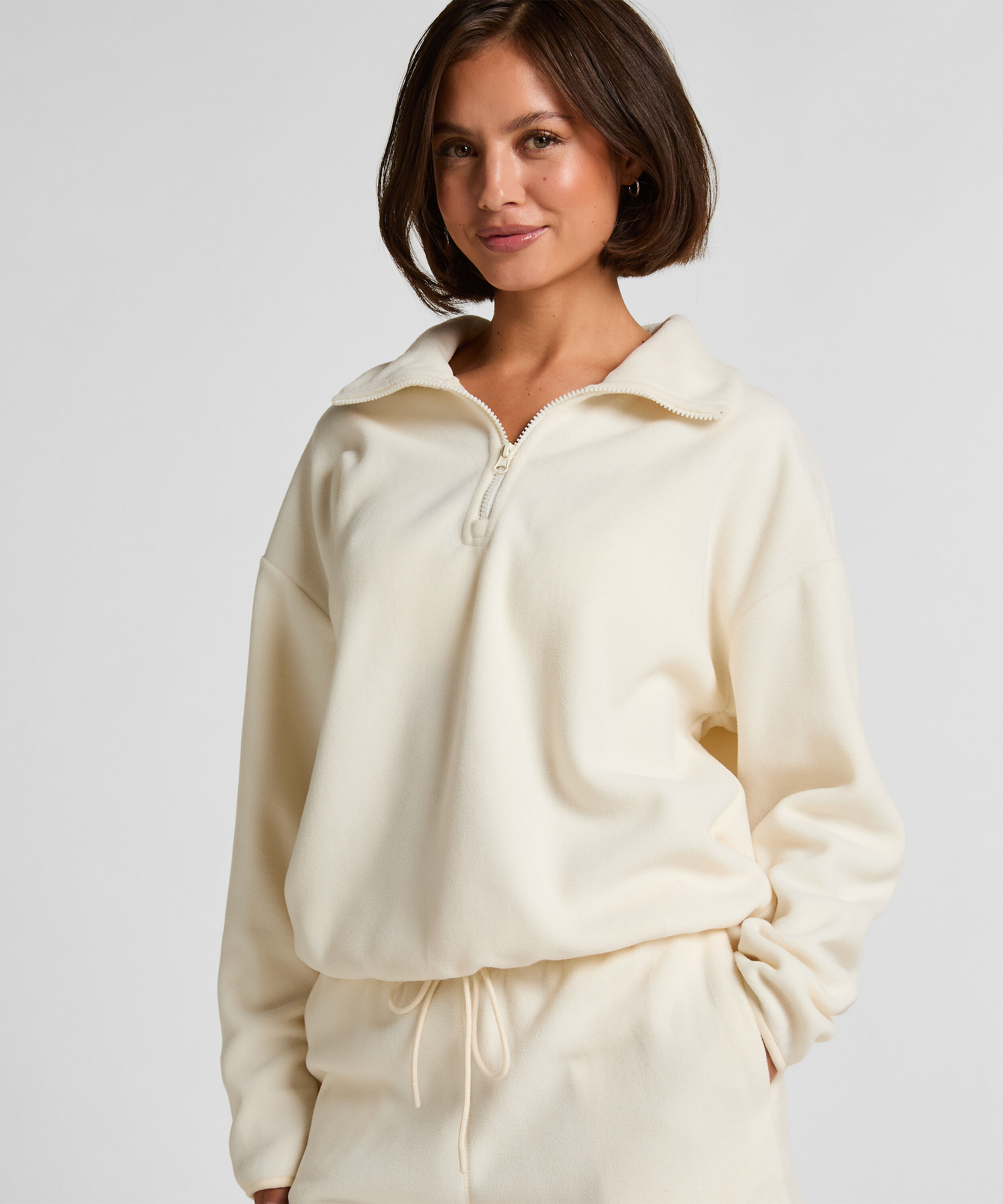 Sportliches Top aus Fleece mit halbem Reißverschluss, Weiß Sportliches Top aus Fleece mit halbem Reißverschluss, Weiß