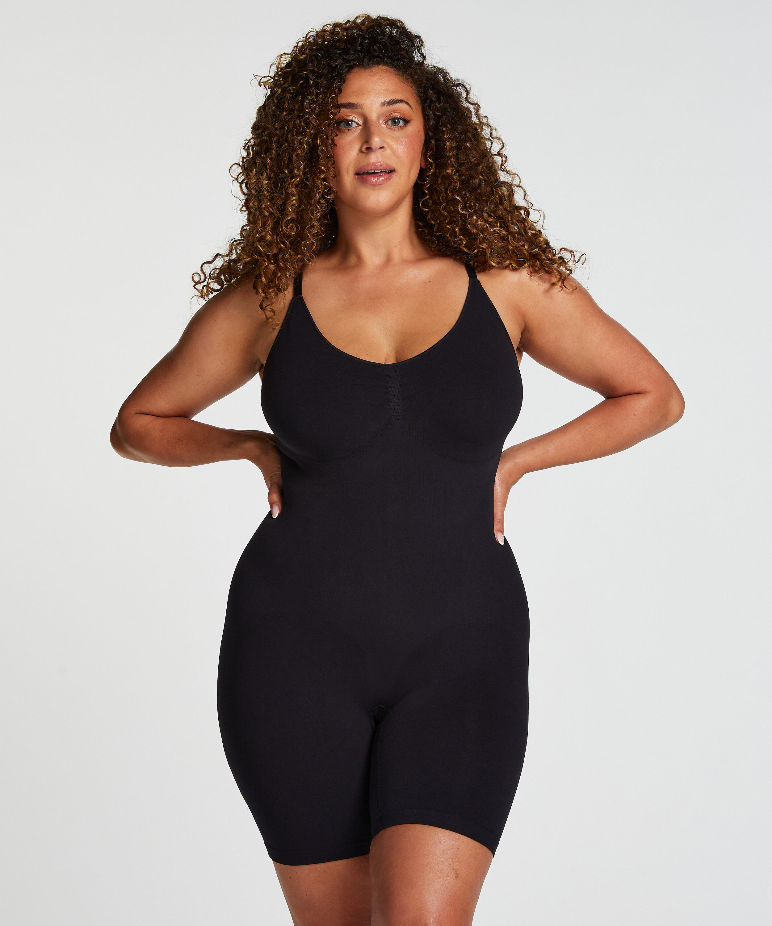 Nahtlos betonender Bodysuit mit hohem Beinausschnitt, Schwarz