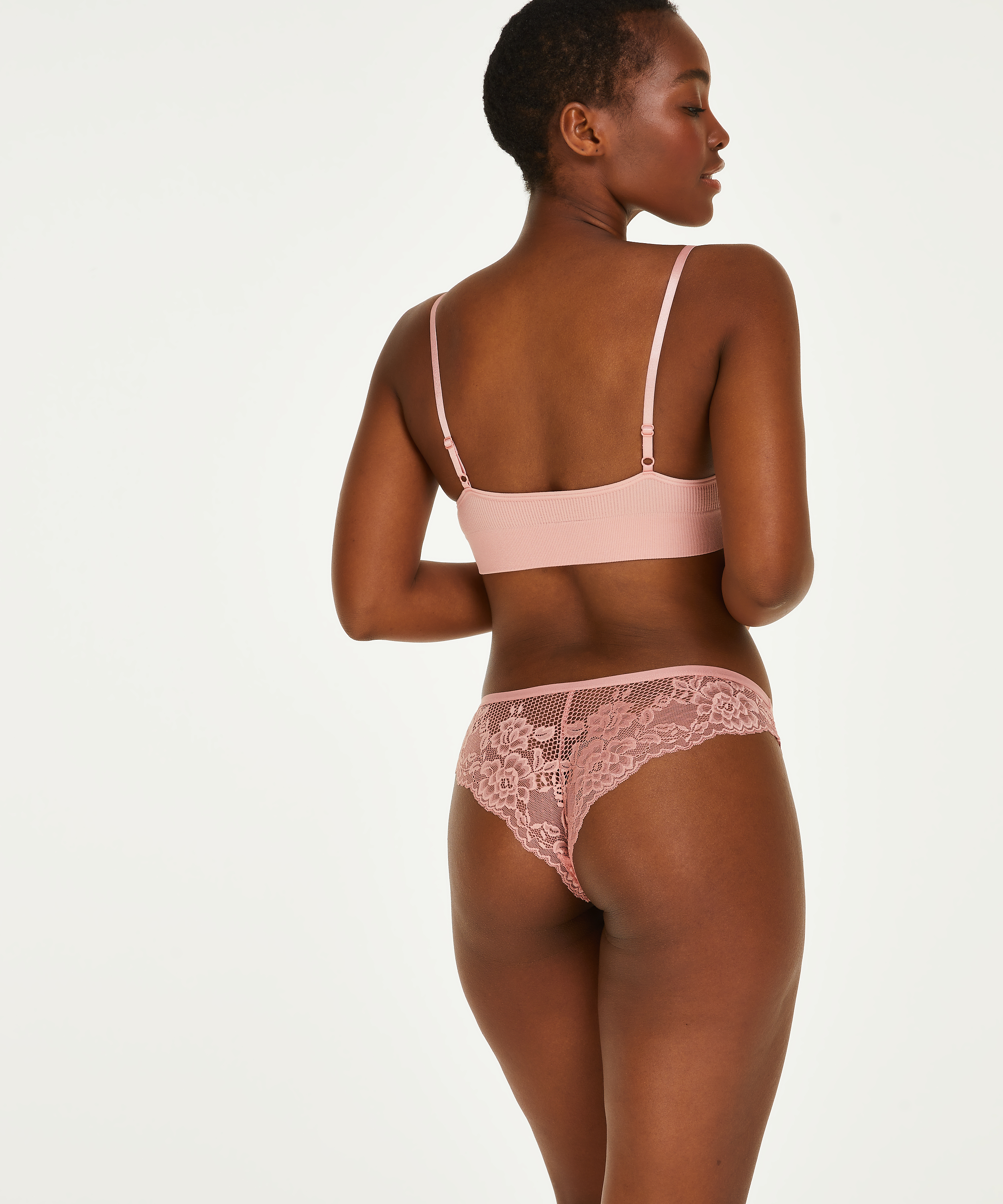 Slip brésilien Bianca, Rose, main